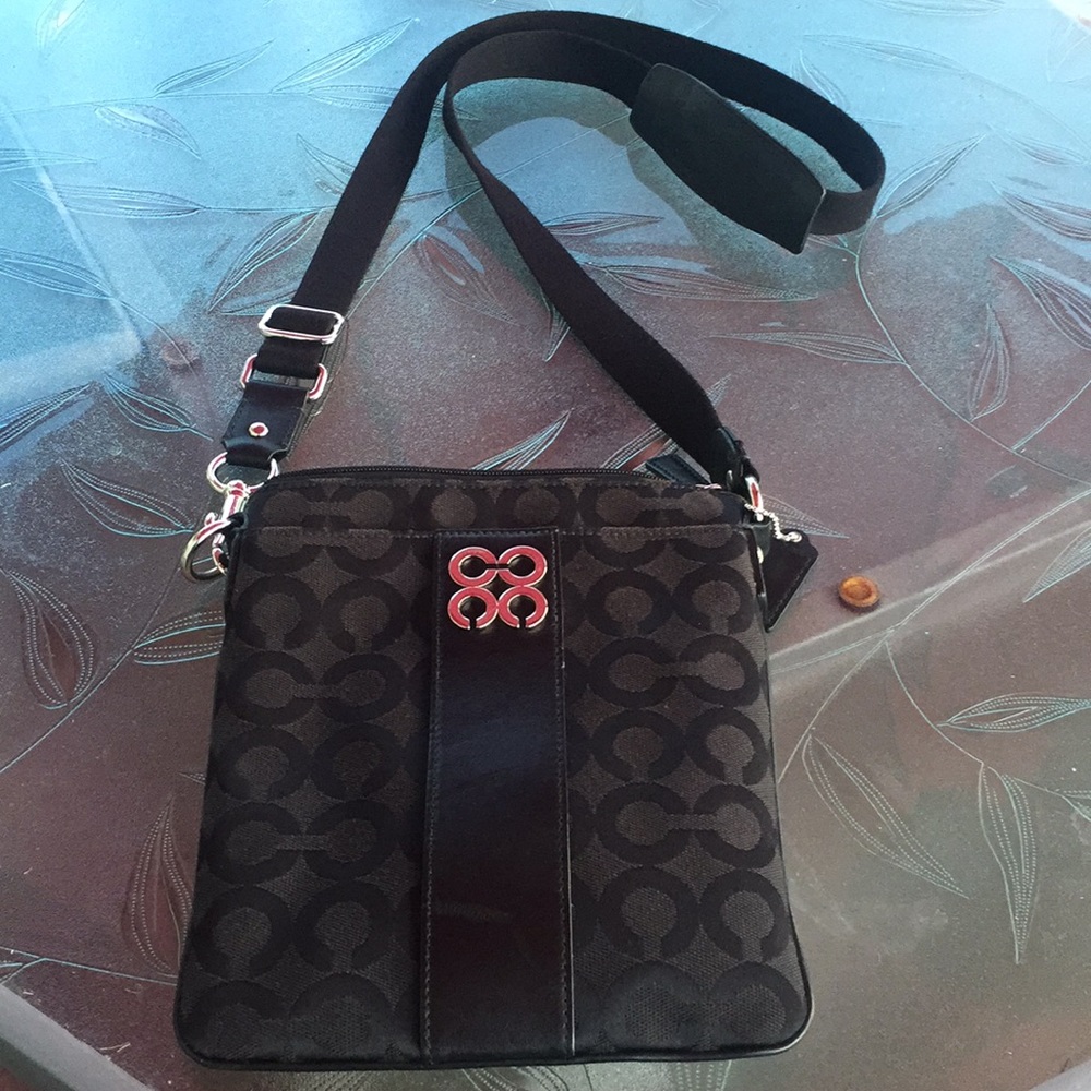 Coach cross body bag used 1 time excellent cond.